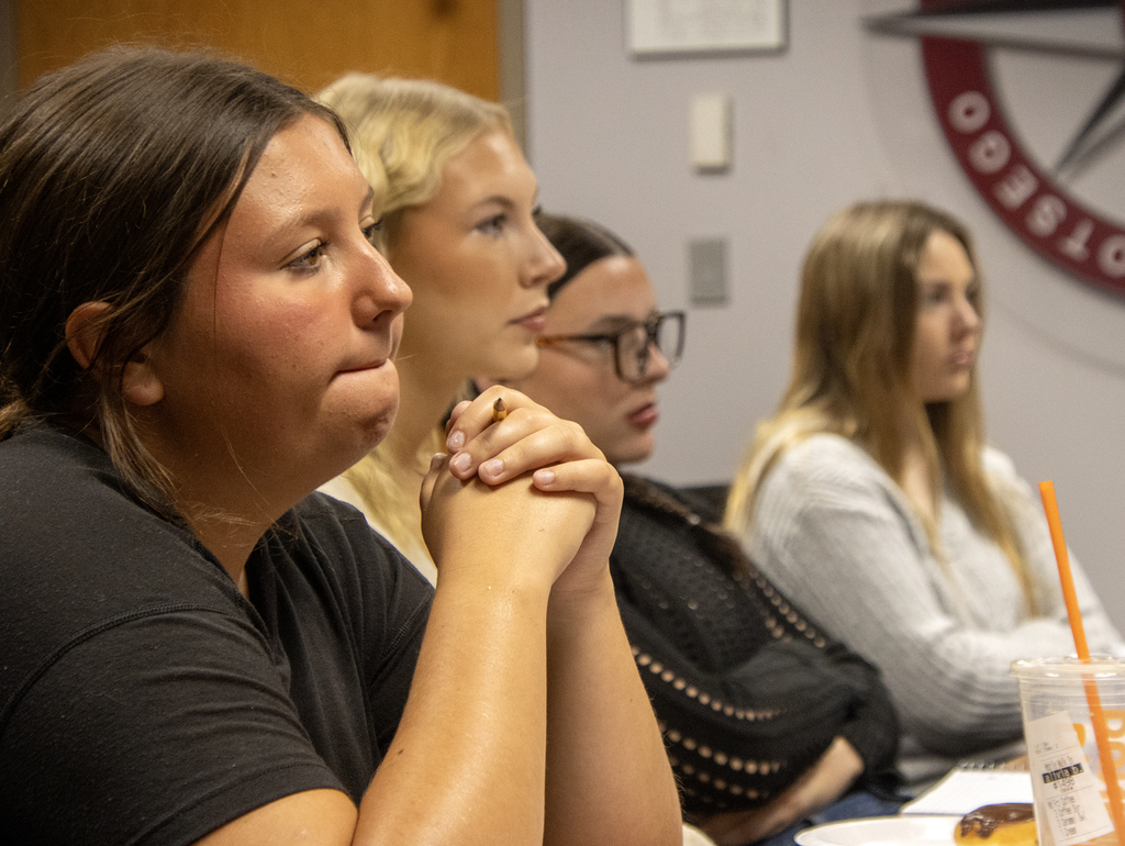 4 students listening