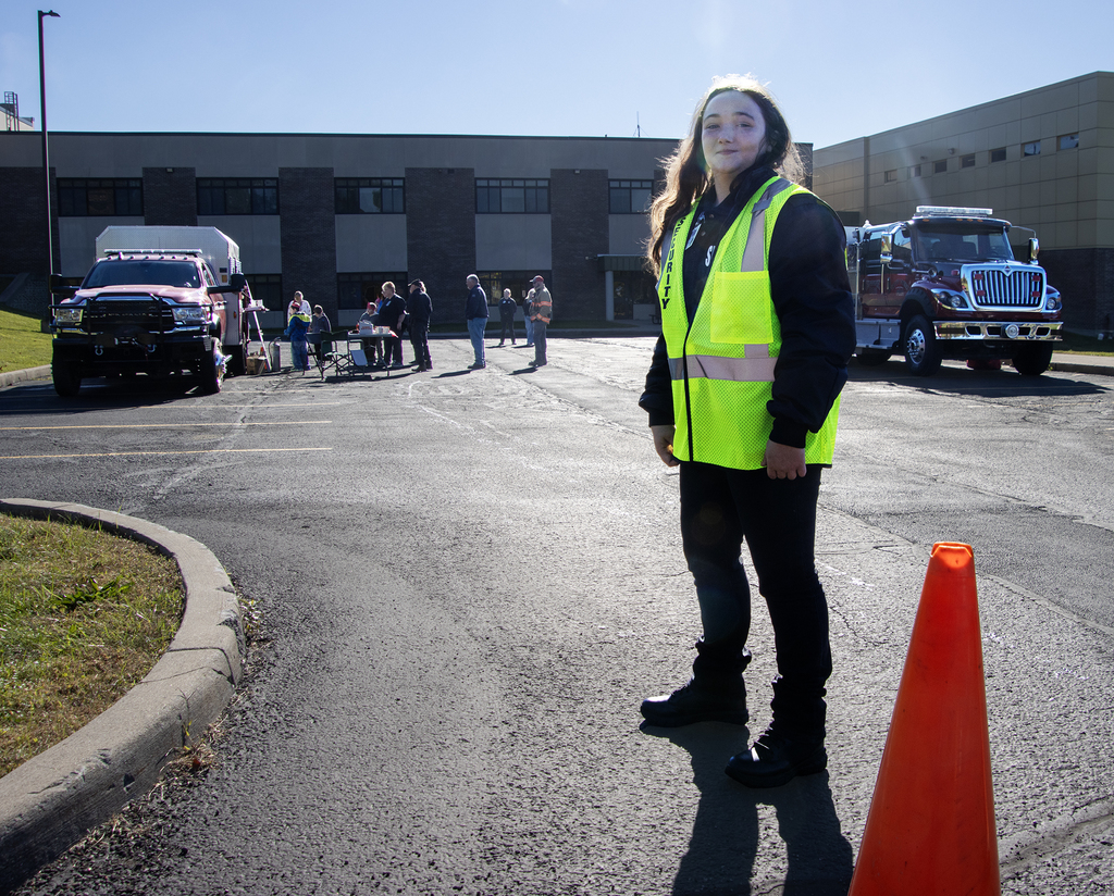 security & law enforcement student  guards the entrance
