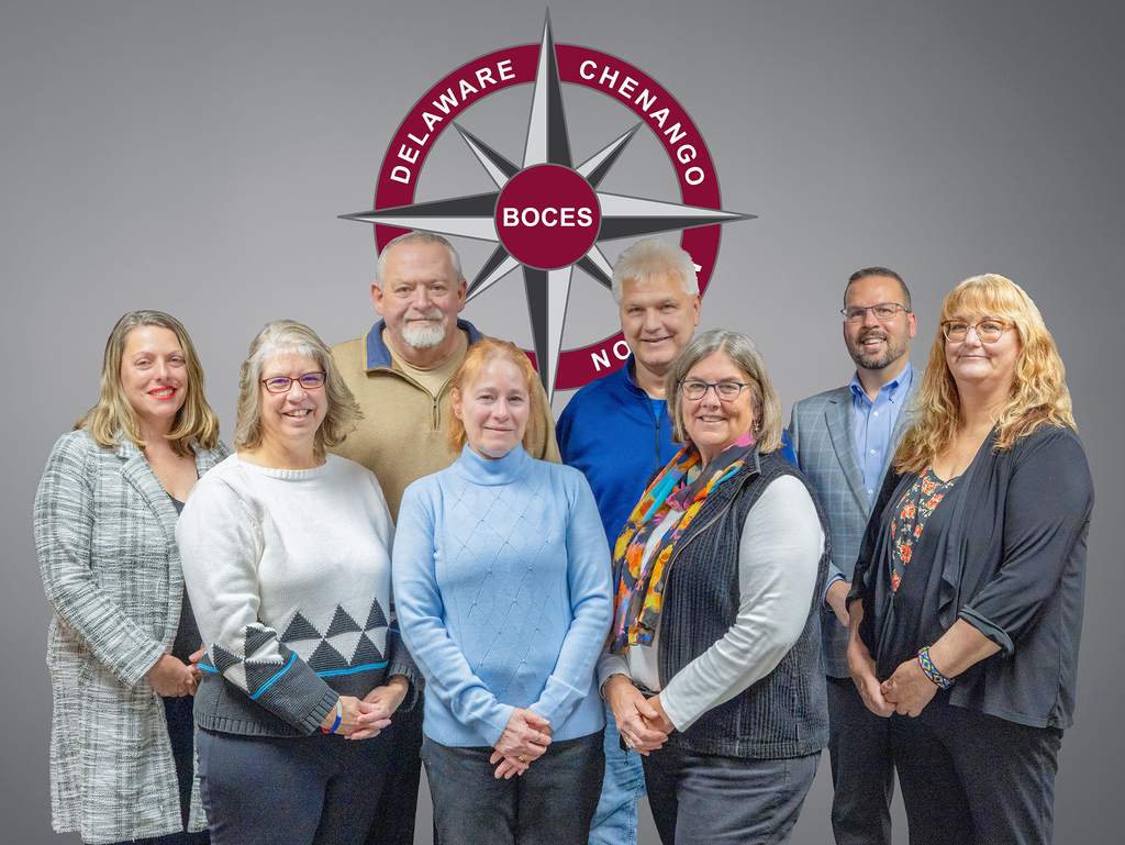 7 DCMO BOCES board members plus district superintendent in a group photo