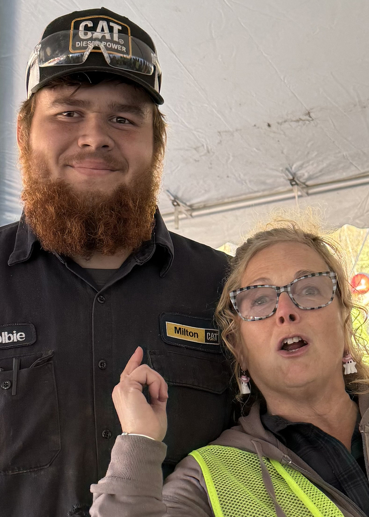 Teacher Laurie Marks with graduate of the welding program