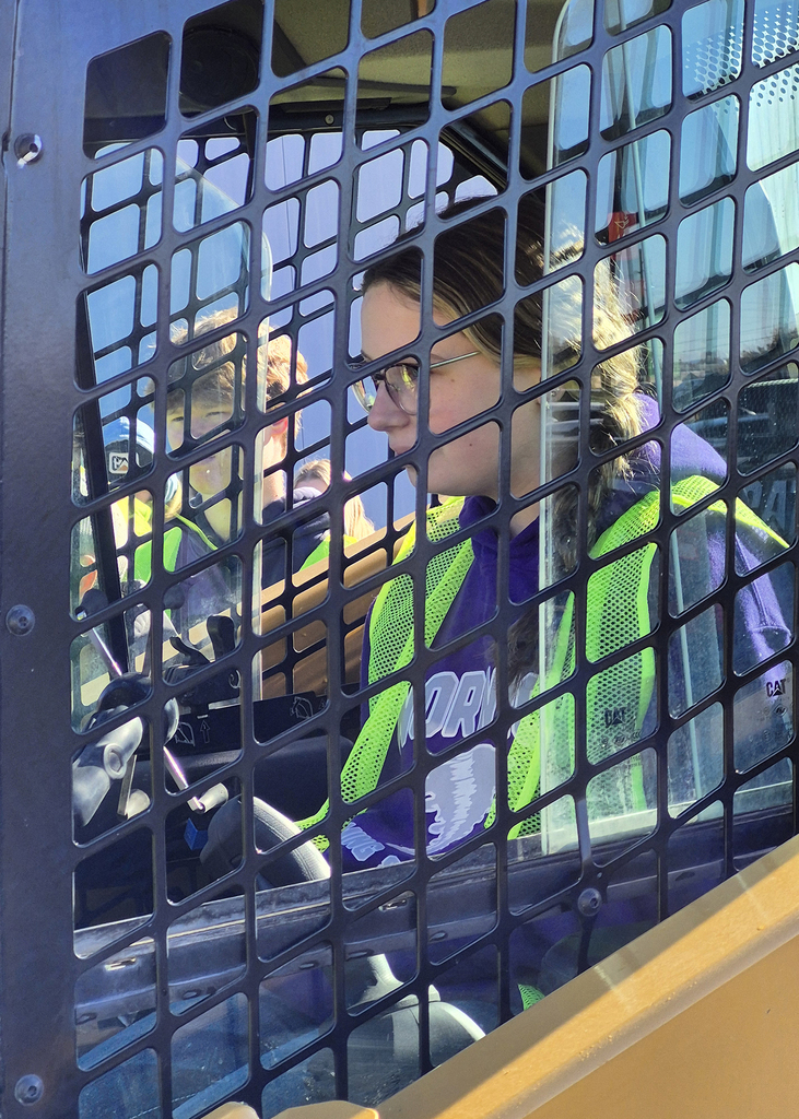 student in drivers cage