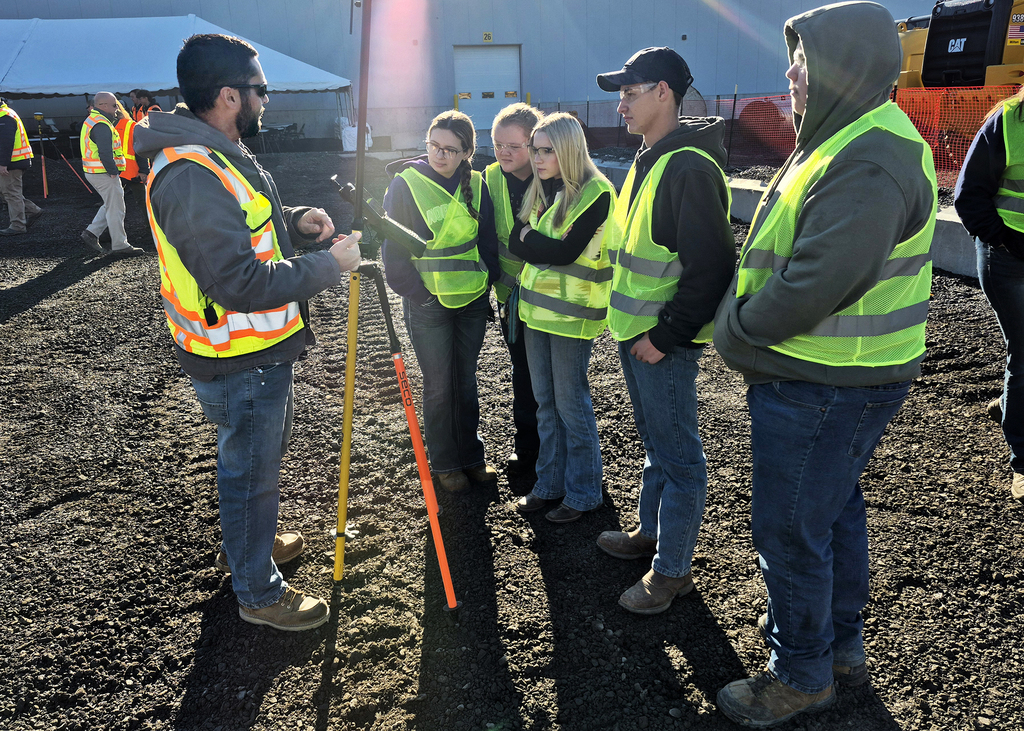 Milton Caterpillar employee demonstrate equipment to students