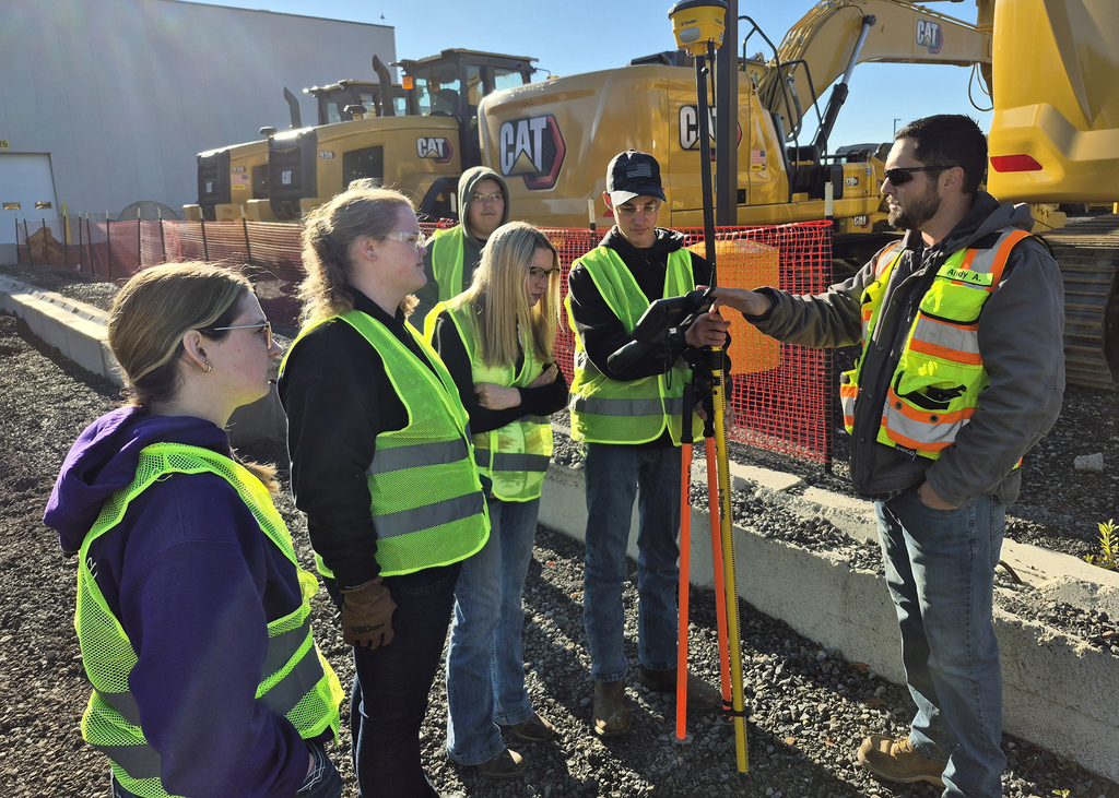Milton Caterpillar employee demonstrate equipment to students