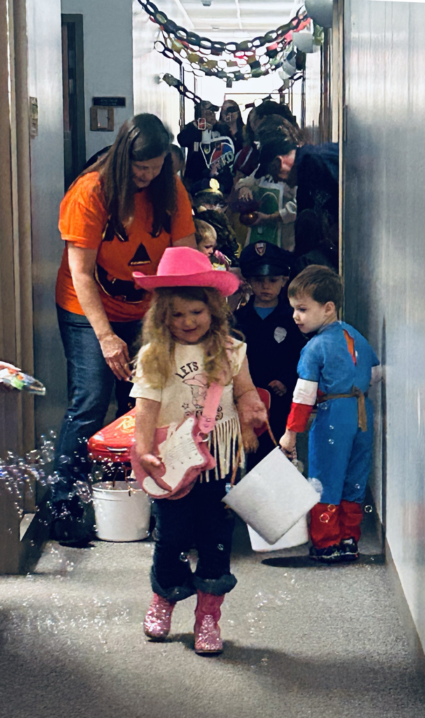 preschool children trick or treating at the Support Services Center