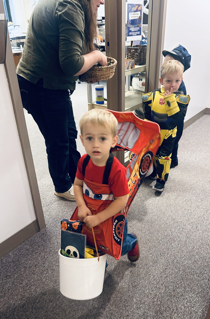 preschool children trick or treating at the Support Services Center