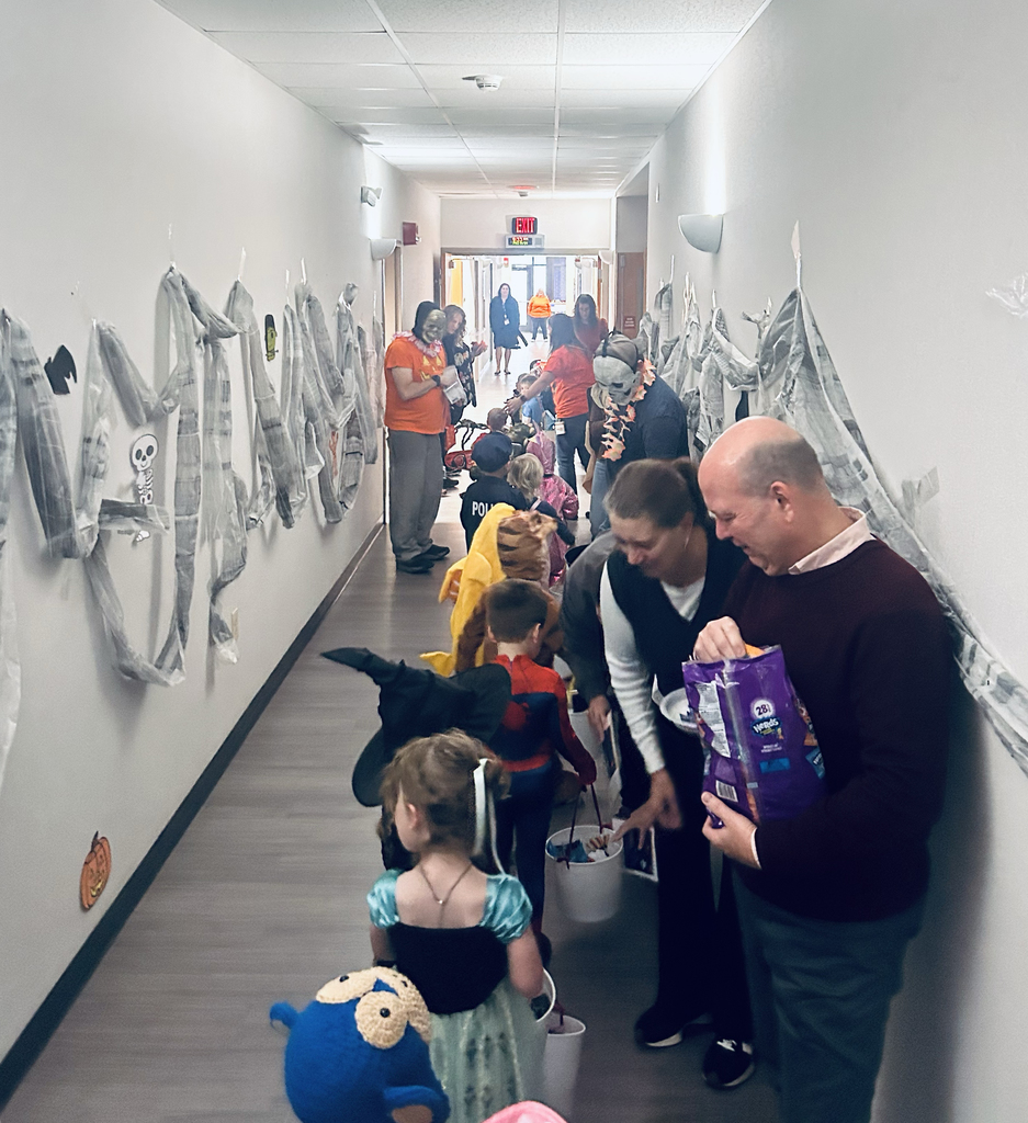 preschool children trick or treating at the Support Services Center