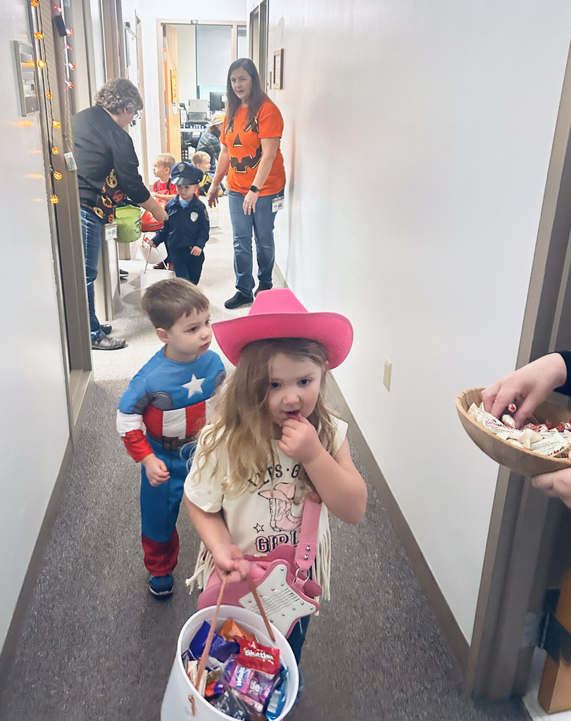 preschool children trick or treating at the Support Services Center