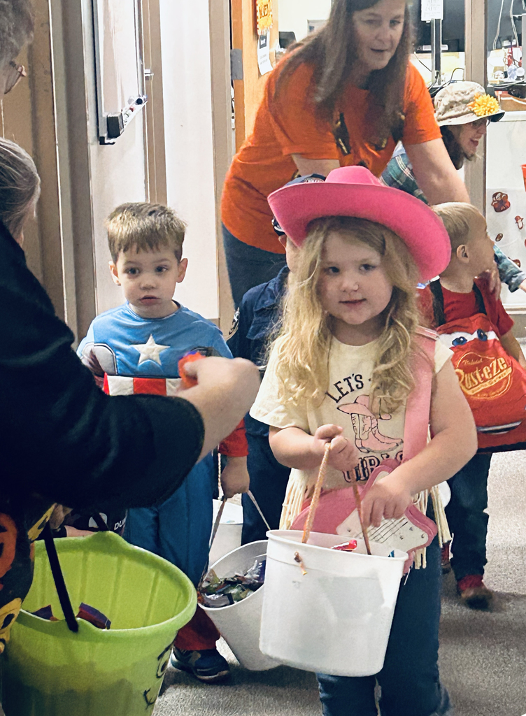 preschool children trick or treating at the Support Services Center