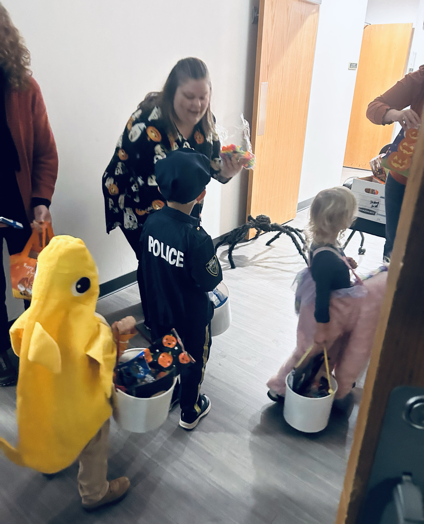 preschool children trick or treating at the Support Services Center