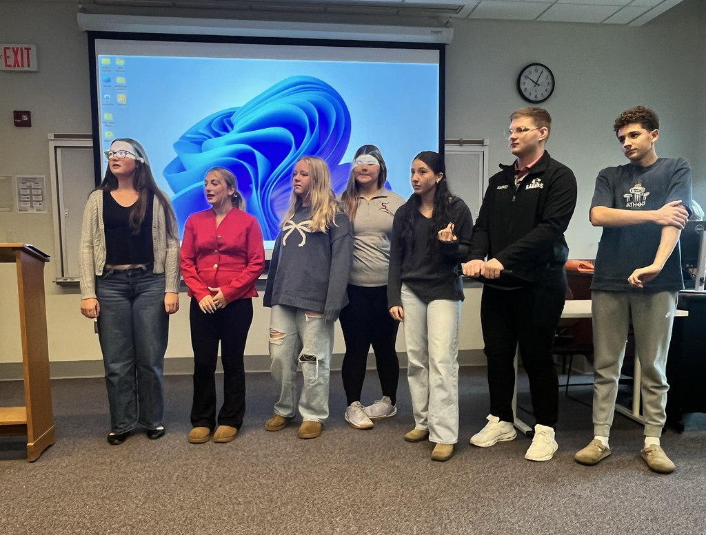 New Visions students stand in classroom