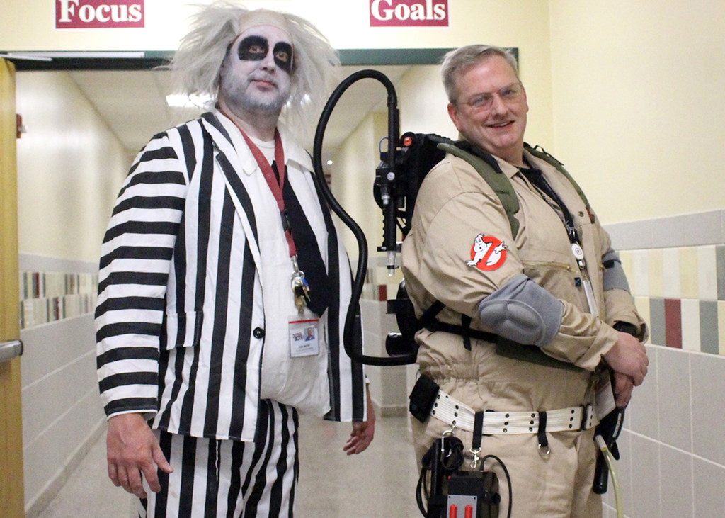 administrators in Beetlejuice and Ghostbusters costumes