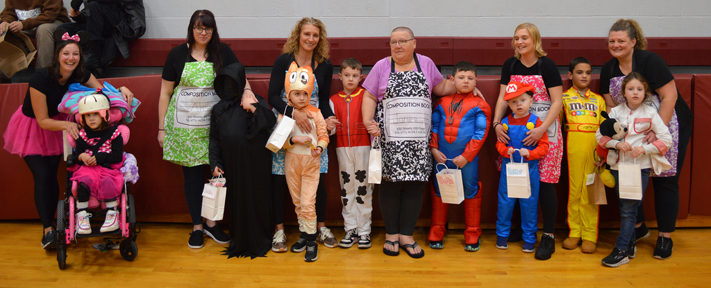 6 adults and 8 students in costume