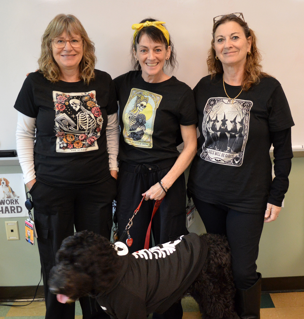 3 teachers and a dog in costume
