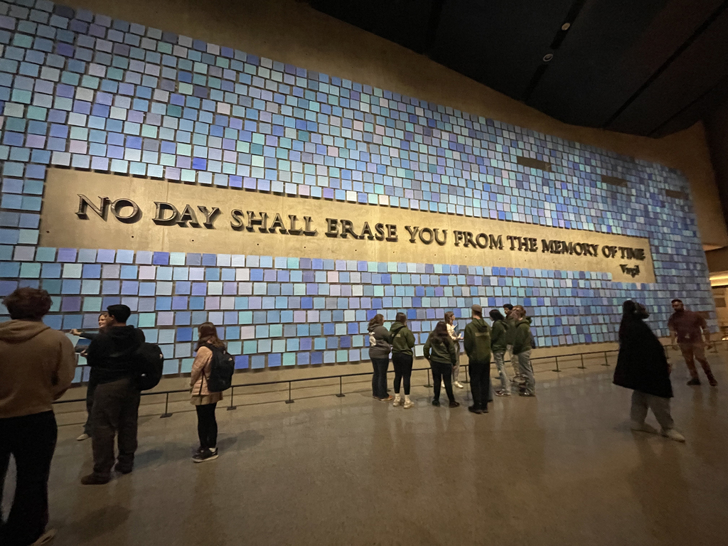 Students in NYC at 9/11 memorial site: No Day shall erase you from the memory of time (on wall)