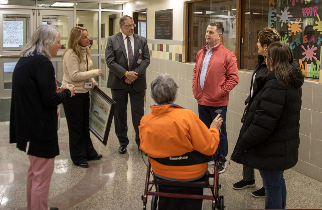 Scott Harrold speaks to DCMO BOCES administrators as his family watches.