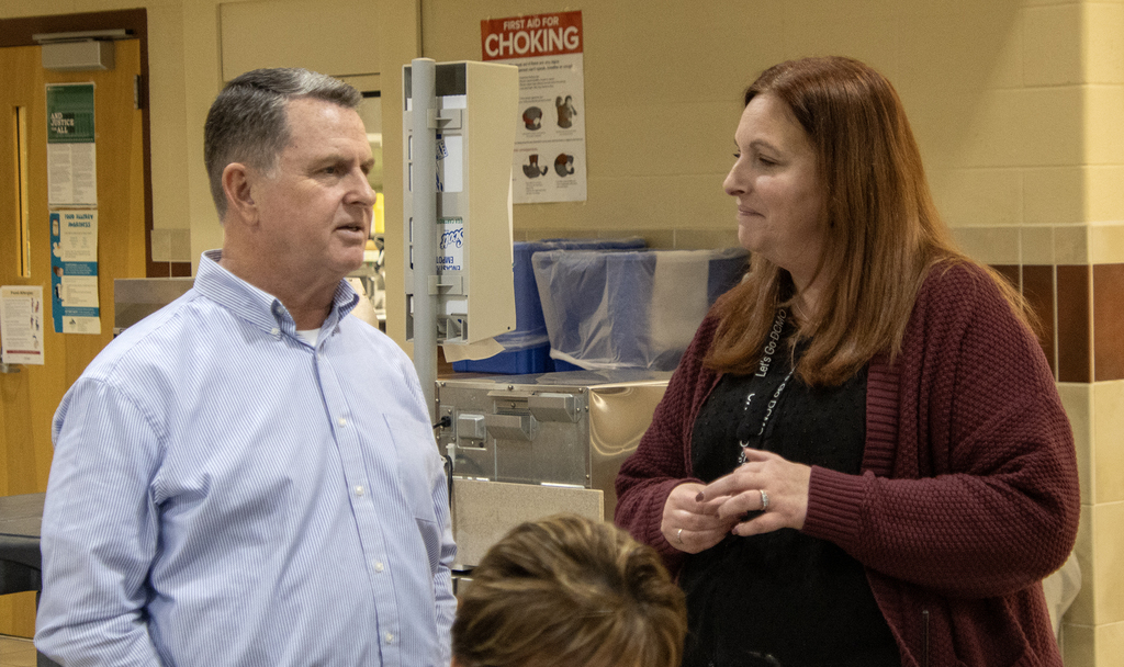 Scott Harrold speaks with Roula Ragusa, Harrold Campus principal