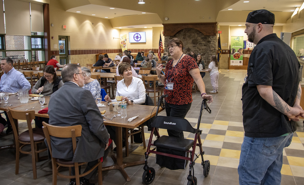 Chef Jeanni Romanowski speaks to the group