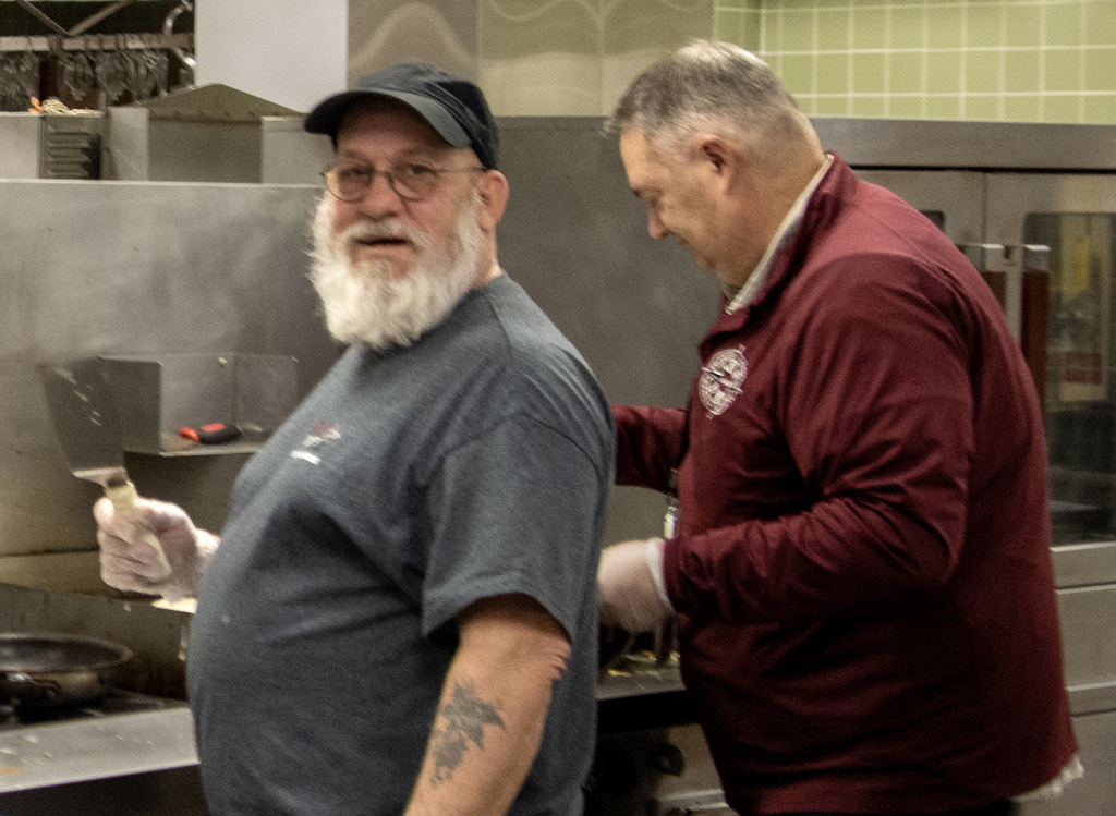 Tom and Randy cook pancakes