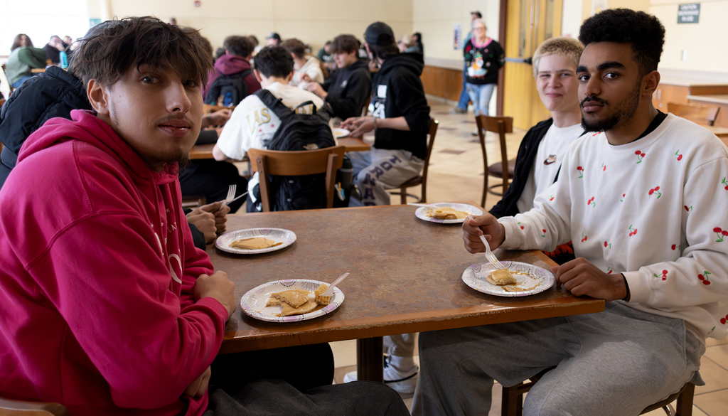 barbering students eating panckaes