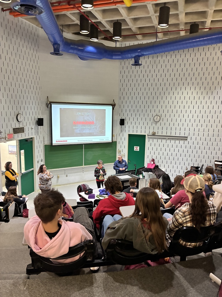 students listening to presenters at SUNY Broome