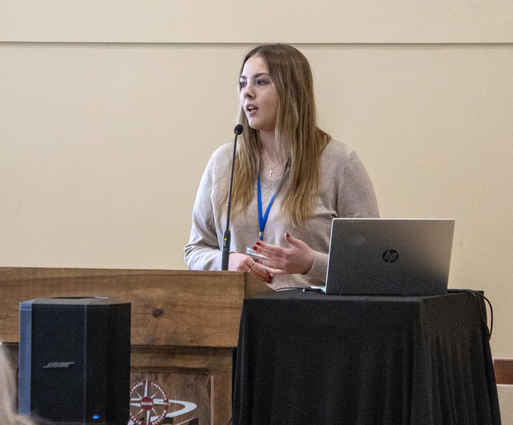 a student speaker at lectern