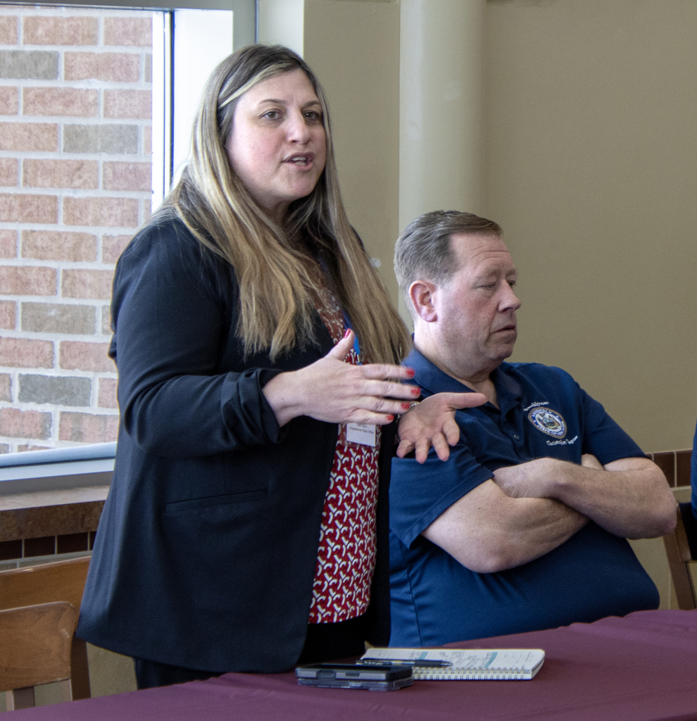 Congressman Josh Riley's representative Faith Vivra speaking