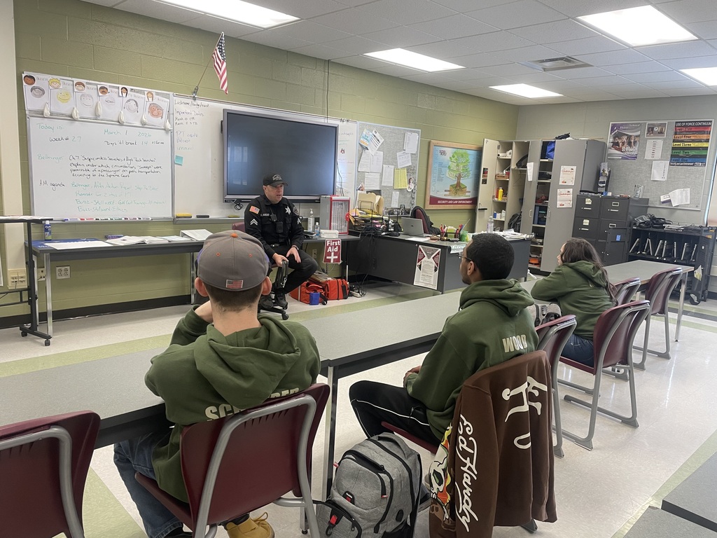 Corporal Karcher speaks to class