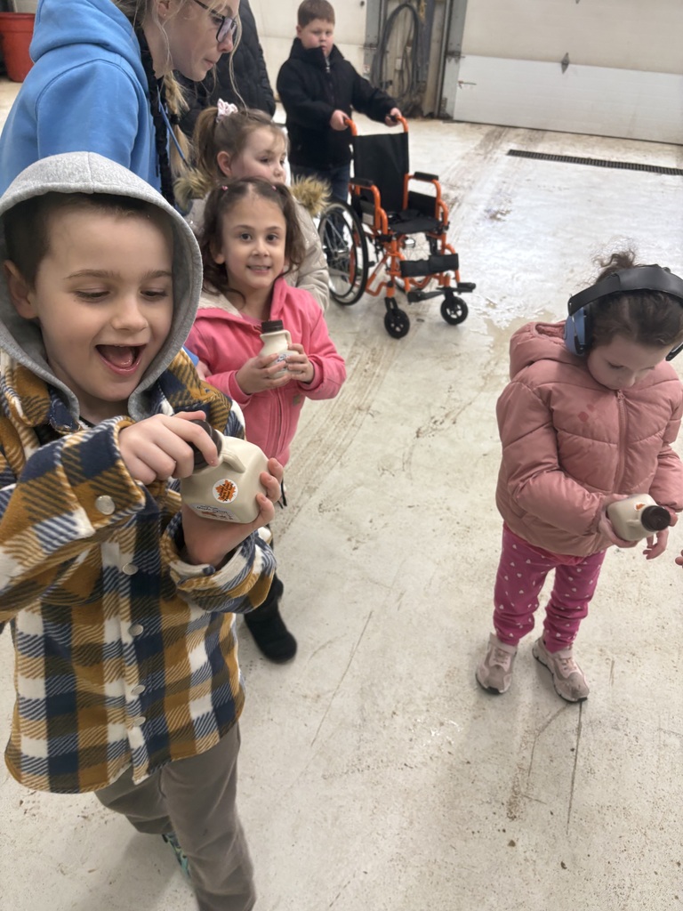 small children with maple syrup