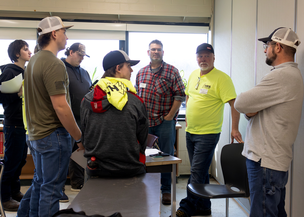 Group of students speak with HRS Forestry recruiters