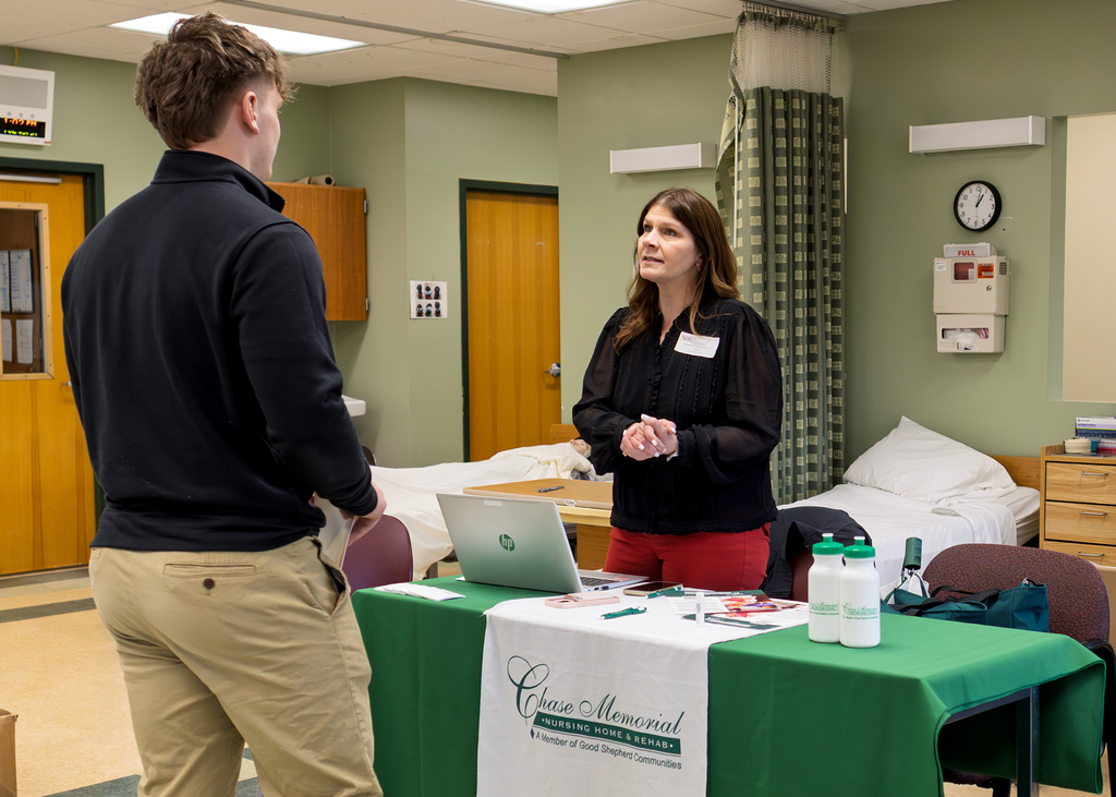 Student speaks with Chase Nursing Home representative