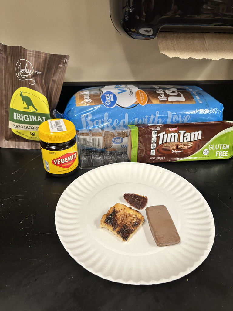 A selection of snacks from Australia, including Vegemite, Kangaroo Jerky and Tim Tams cookies