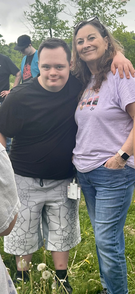 student and teacher pose