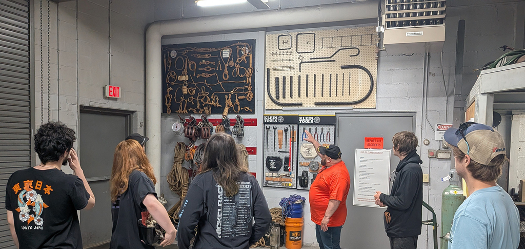Corey Mossow, Training Coordinator and Business Agent for the Ironworkers Local 60, speaks to students at the training center