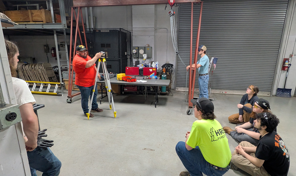 Corey Mossow, Training Coordinator and Business Agent for the Ironworkers Local 60 speaks to students at the training center