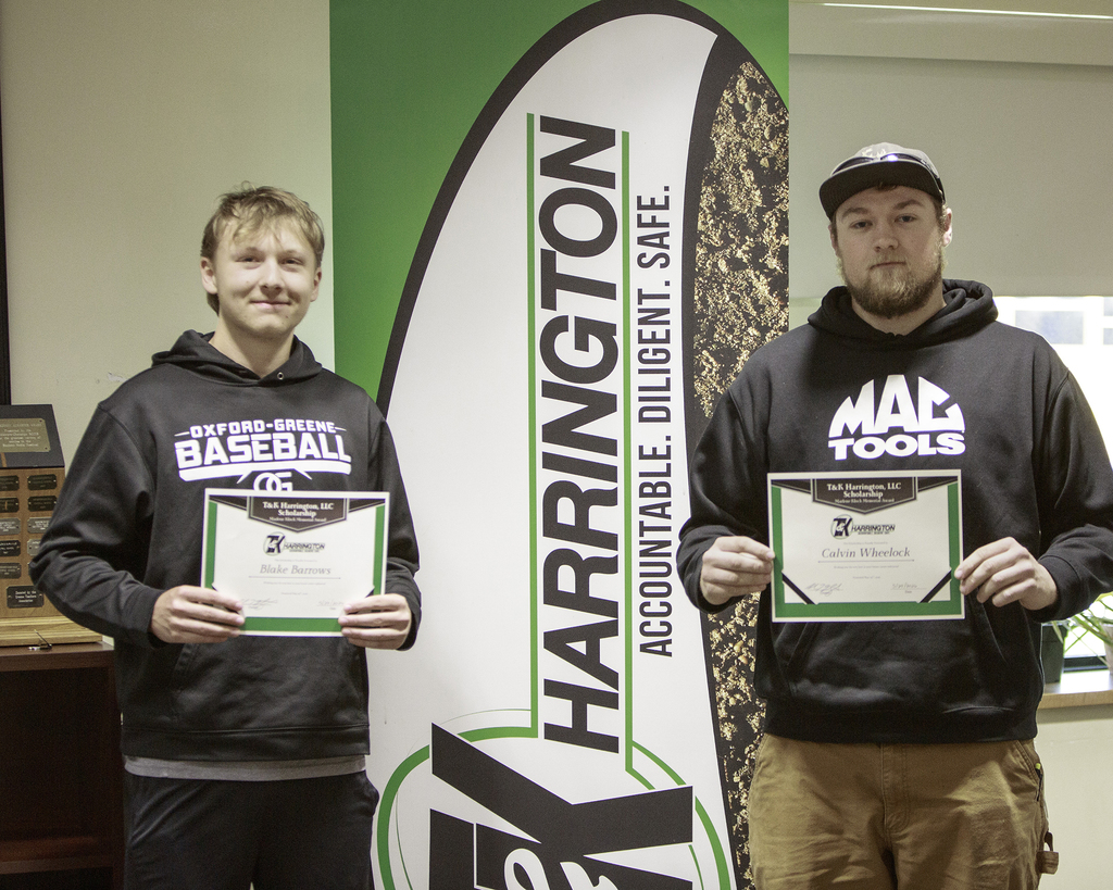 Blake Barrows and Calvin Wheelock pose with their scholarship Cewrtificates