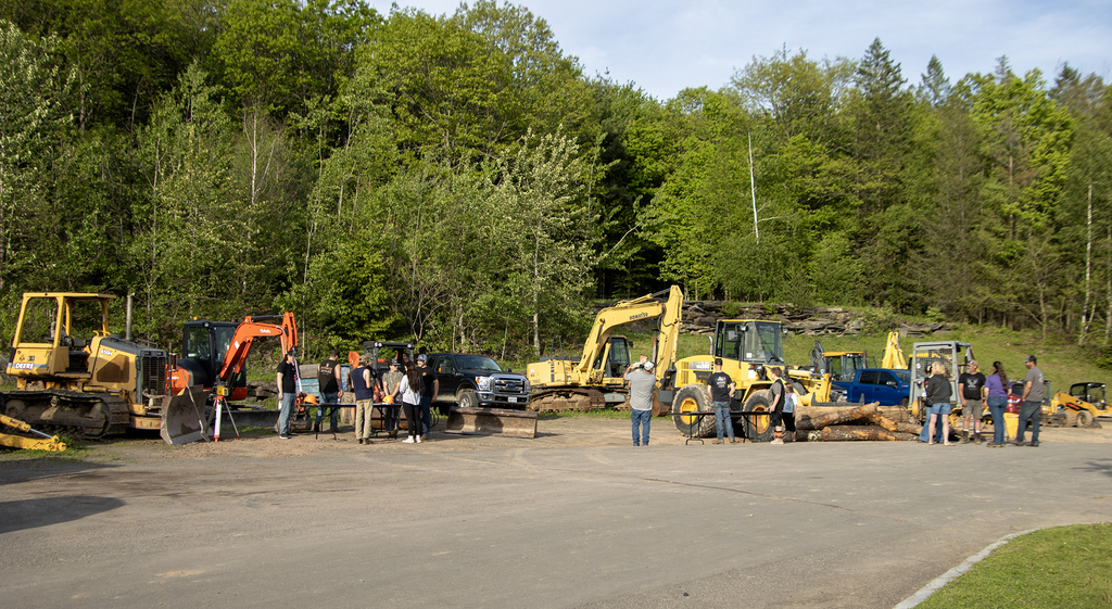 Conservatioin students outside with their heavy equipment disolay