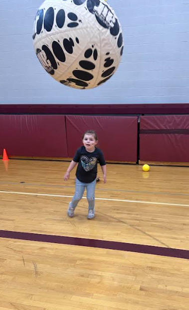 student having fun in the gym