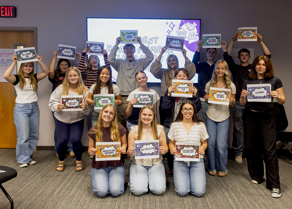 group photo of 16 students