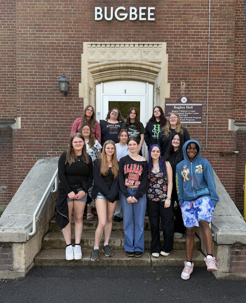 students pose in a group at the Bugbee School