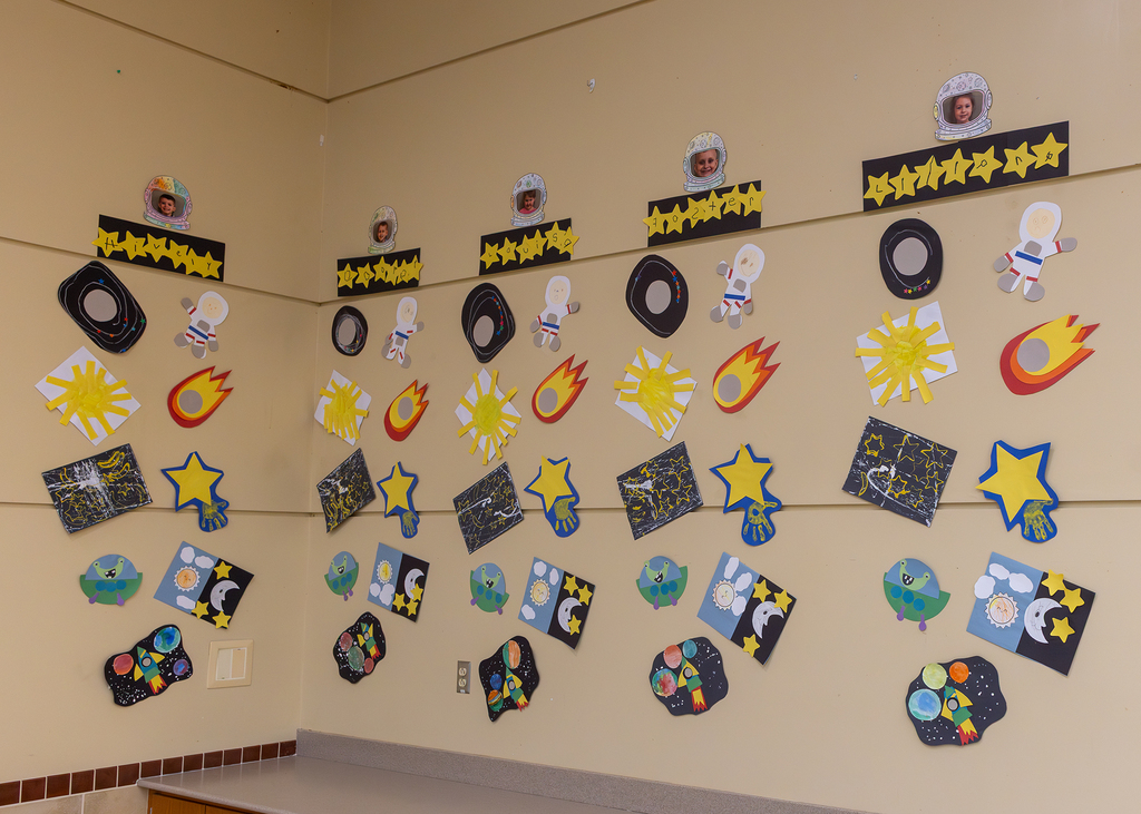 walls decorated with preschool children's work