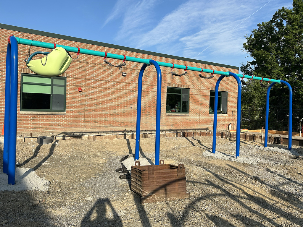 swingset frame installed in new playground
