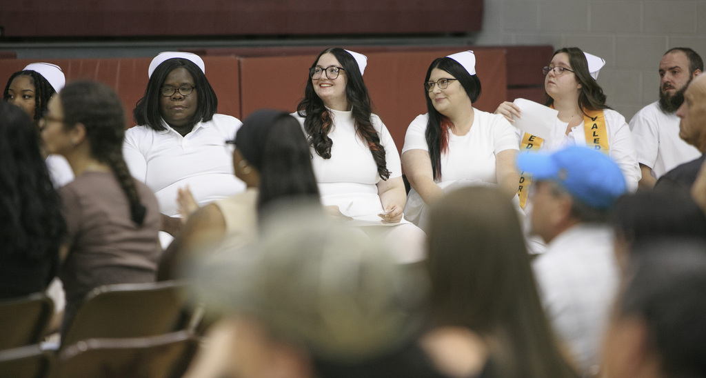 nursing students sitting and listening