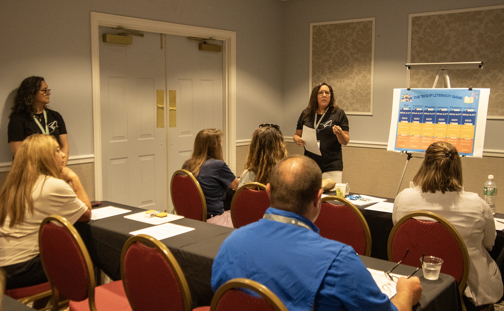 Christine Newell presents to a room of participants