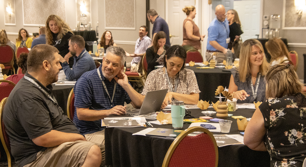 leadership conference participants at tables
