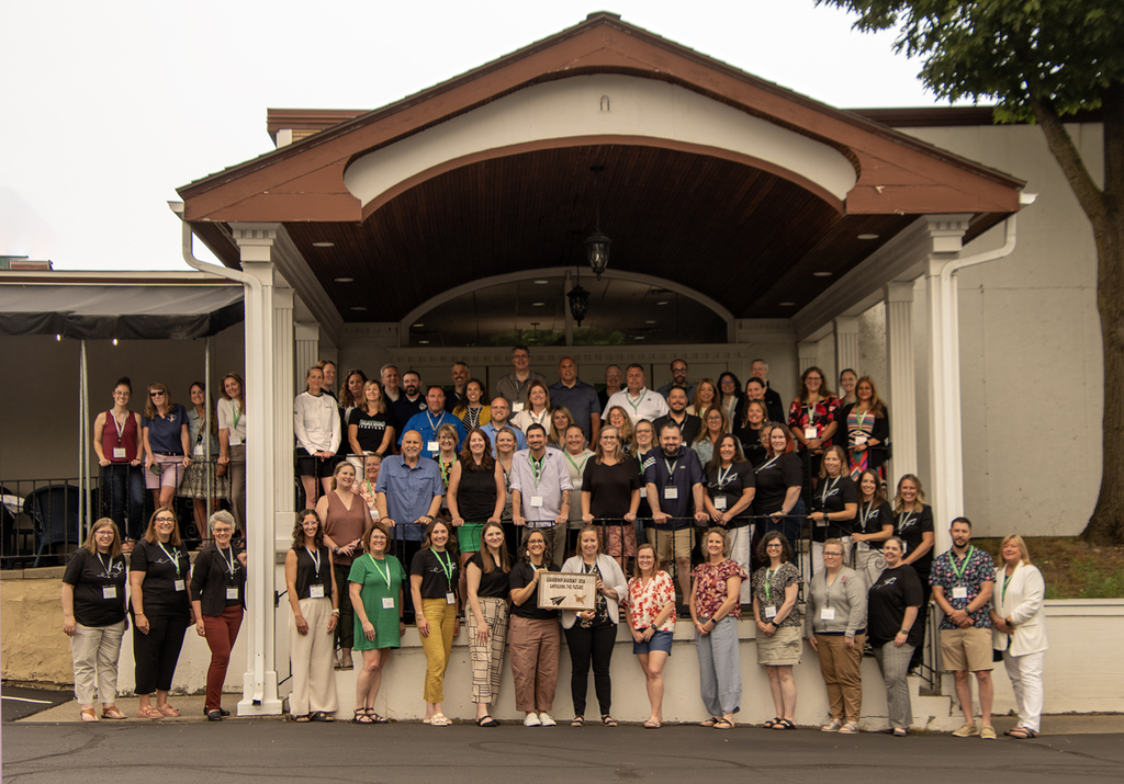 Group photo of Leadership Conferencen participants in front of building 