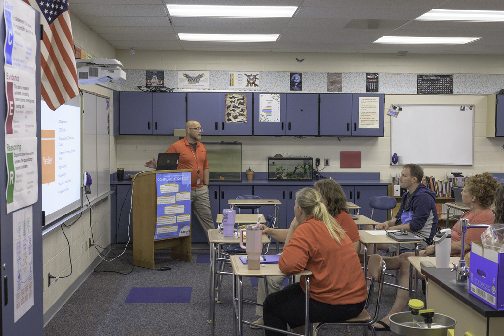 presenter speaking to group in a breakout room
