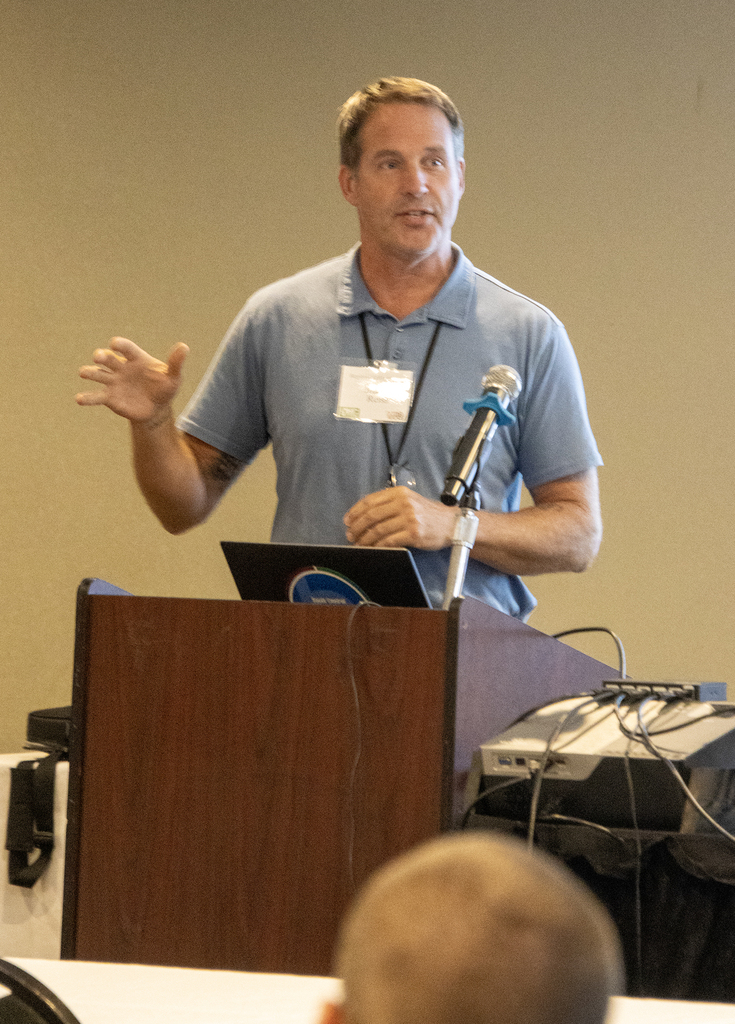 Josh Reiss speaking at lectern