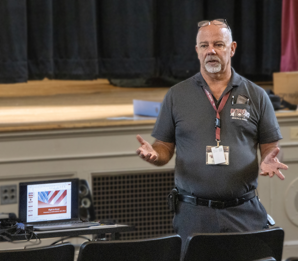 Rick Shaw gestures as he speaks at Right To Know presentation