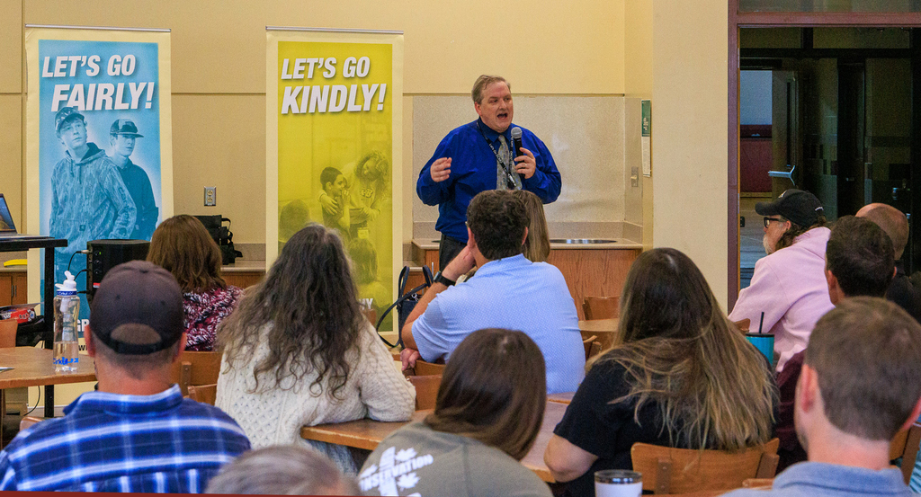 Ryan DeMars speaks to staff at Pole Campus