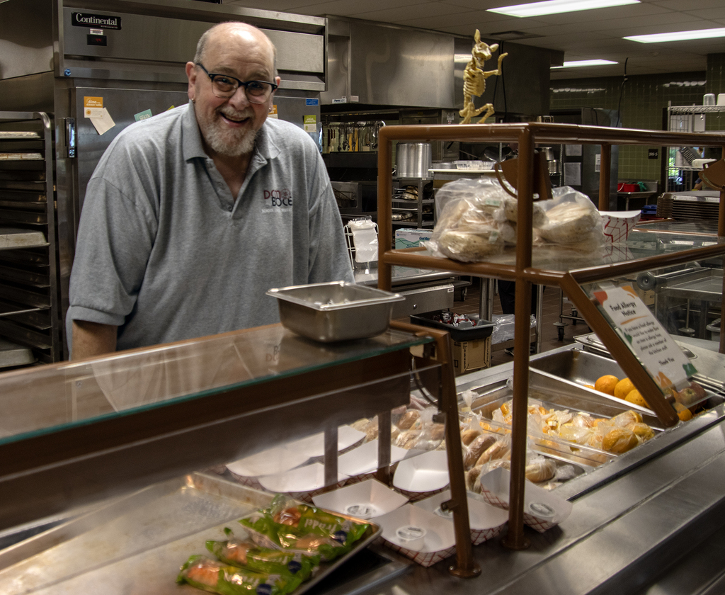 Cafeteria worker smiling at Harrold Campus